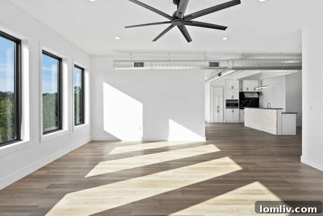 Expansive recreation room on the lower level of the Fort Worth luxury home, ideal for a pool table, media center, or home gym