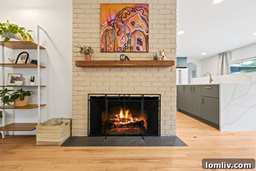 Erick and Chelsea Sigmond's Stunning East Dallas Ranch Transformation 22 A beautifully styled living space with modern furniture and unique lighting