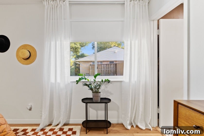 Erick and Chelsea Sigmond's Stunning East Dallas Ranch Transformation 23 Another view of the renovated interior, demonstrating excellent use of space and natural light