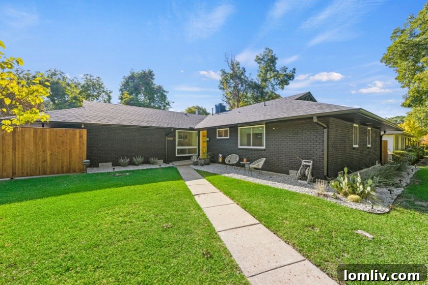 Erick and Chelsea Sigmond's Stunning East Dallas Ranch Transformation 4 After renovation interior view showcasing modern design and natural light