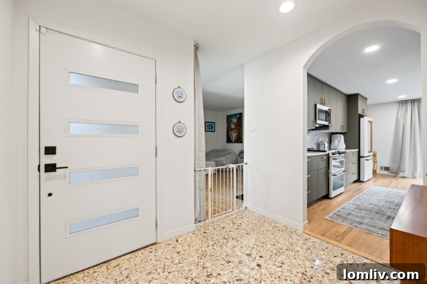 Erick and Chelsea Sigmond's Stunning East Dallas Ranch Transformation 6 After renovation kitchen with new countertops, appliances, and cabinetry