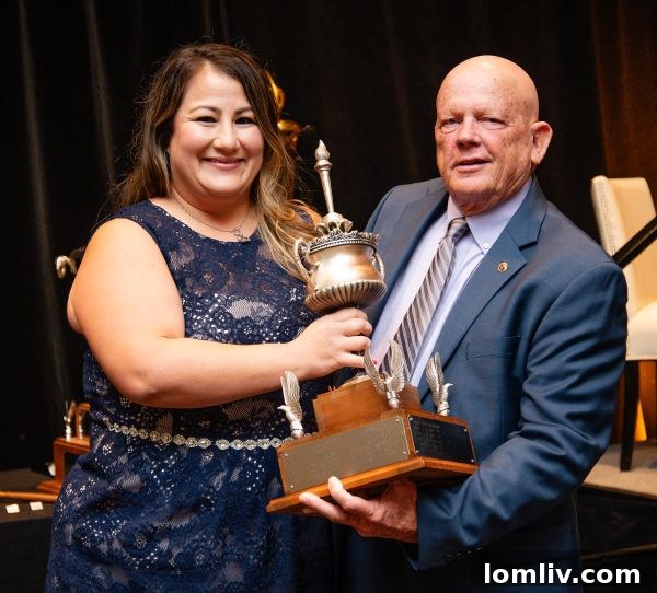 Adam Lingenfelter, Luxury Builder, Takes Helm of Dallas Builders Association Board 4 Donnie Evans of Altura Homes, pictured with Misty Varsalone, was awarded The Shorty Howard Trophy as this year’s top membership recruiter.