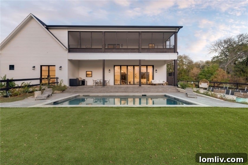 Expansive turfed backyard with a private swimming pool, perfect for outdoor living near Lewisville Lake.