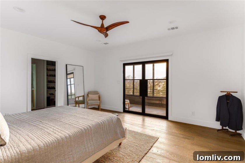 Living room with accordion doors showcasing panoramic views and abundant natural light.