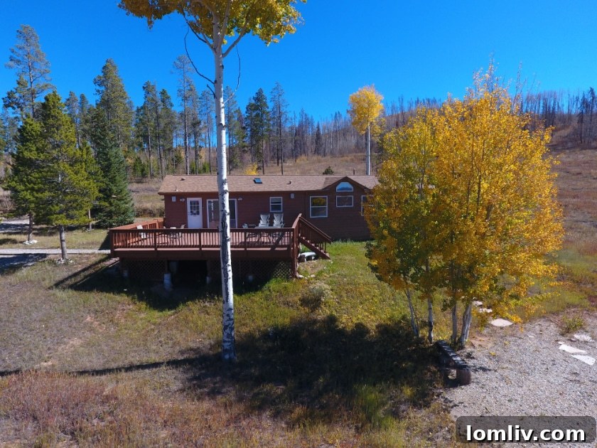 Ranch style home with mountain backdrop
