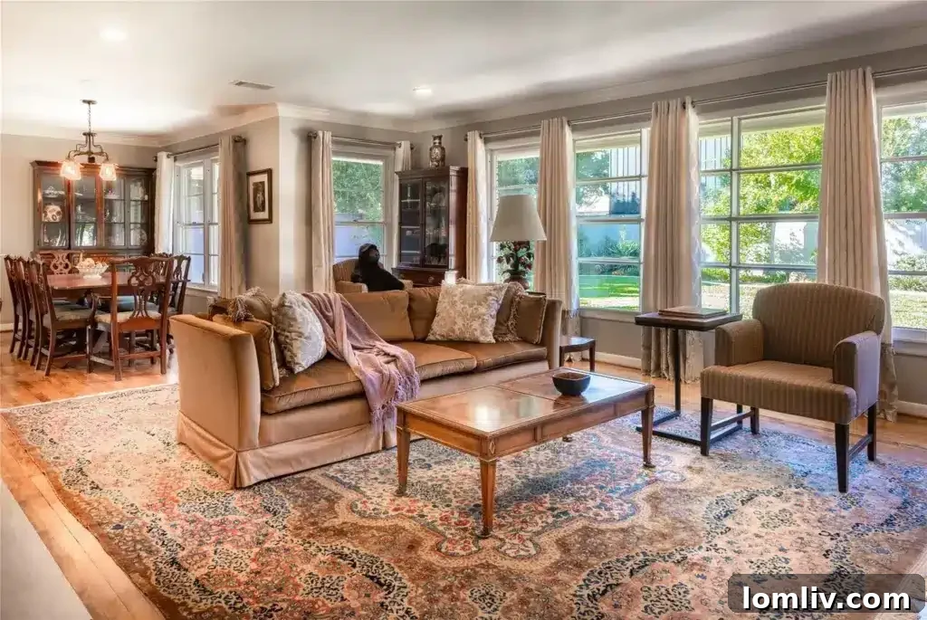 Preston Hollow's Midcentury: The Home That Weathered Judo Outlaws and Tornados 6 Bright and airy living area of the Preston Hollow home, featuring gleaming hardwood floors and ample natural light
