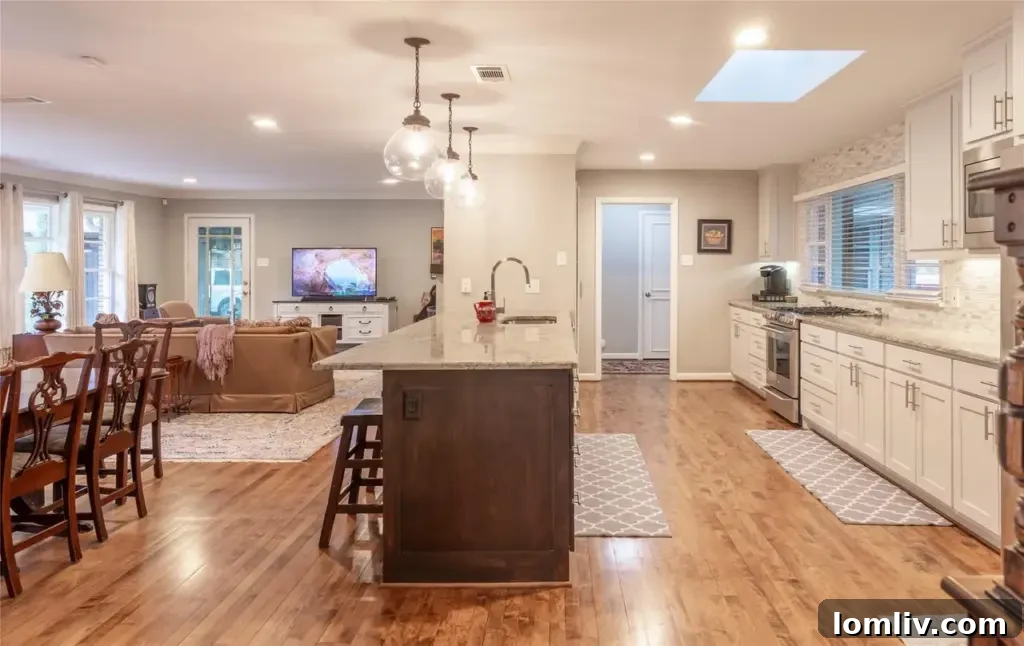 Preston Hollow's Midcentury: The Home That Weathered Judo Outlaws and Tornados 7 Modern, updated kitchen with high-end appliances, stylish countertops, and custom cabinetry, ideal for culinary enthusiasts