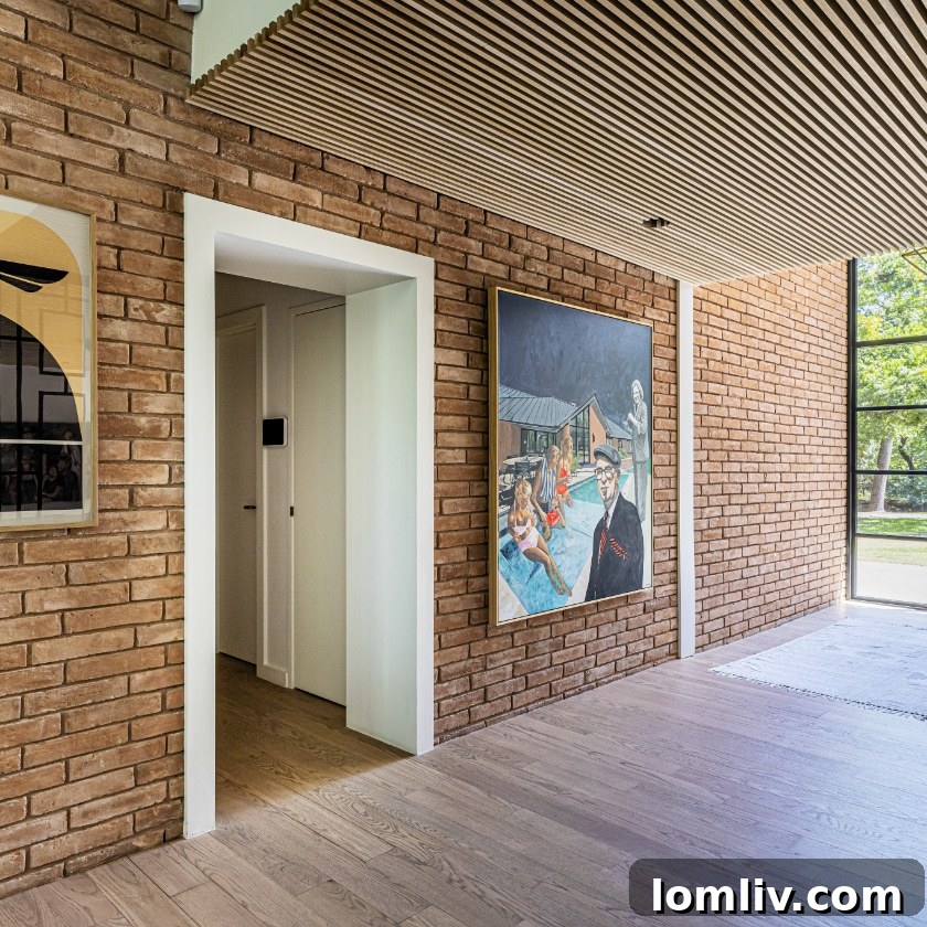 Oak Cliff Heritage Home Tour 2023: Architectural Treasures Along Rainbow Drive 6 The renovated interior of the Rainbow Drive home features a stick ceiling harmonizing with the original St. Joe brick, blending old and new.
