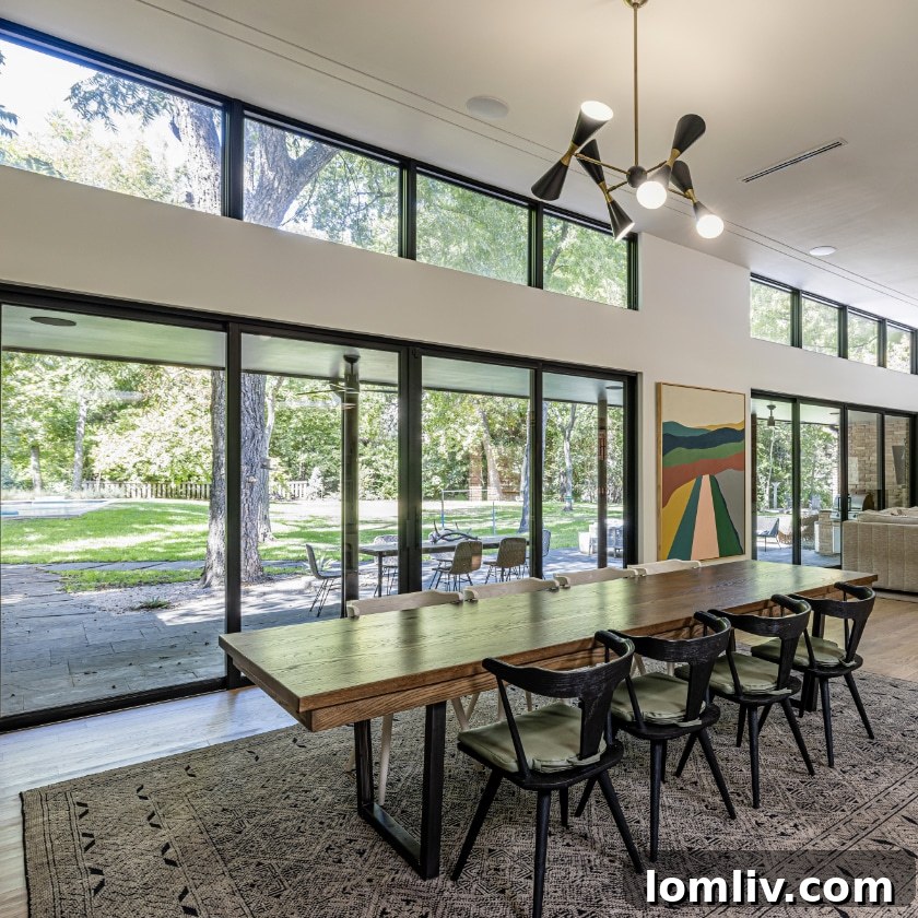 Oak Cliff Heritage Home Tour 2023: Architectural Treasures Along Rainbow Drive 7 A spacious room in the Rainbow Drive home offers expansive views of the surrounding natural landscape.