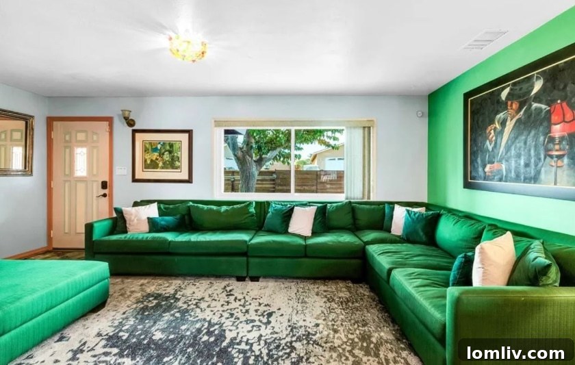 California's Vibrant Embrace: A Home That Feeds the Soul 11 Cozy bedroom with vibrant bedding and natural light, perfect for relaxation, Yucca Valley home