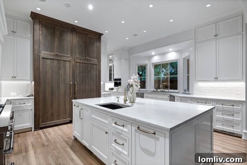 Luxurious primary bedroom with elegant decor and ample natural light