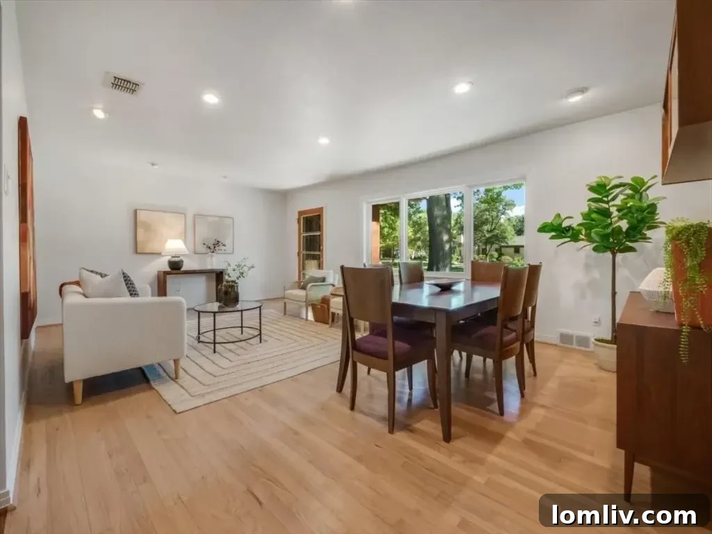 Cozy den with a charming fireplace, offering a private and intimate living space for relaxation.