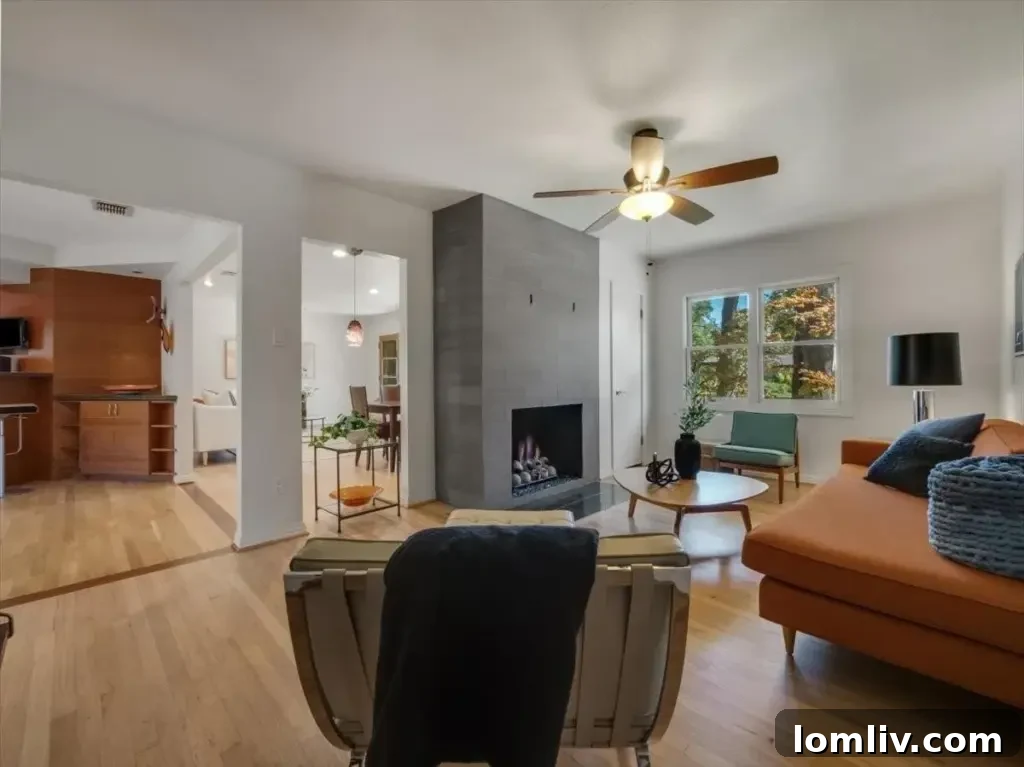 Bright and spacious family room, designed for casual gatherings and everyday comfort, connecting seamlessly with other areas.