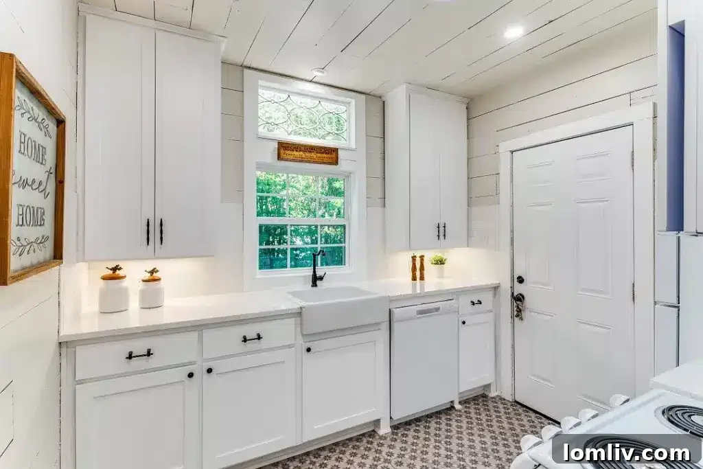 Valarie Kerby's Mineral Wells Listing Amidst the Chaos 11 Living room with shiplap and fireplace