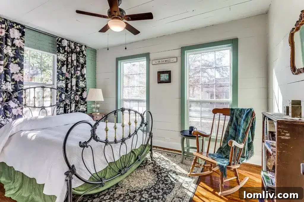 Valarie Kerby's Mineral Wells Listing Amidst the Chaos 13 Bedroom with restored wood floors