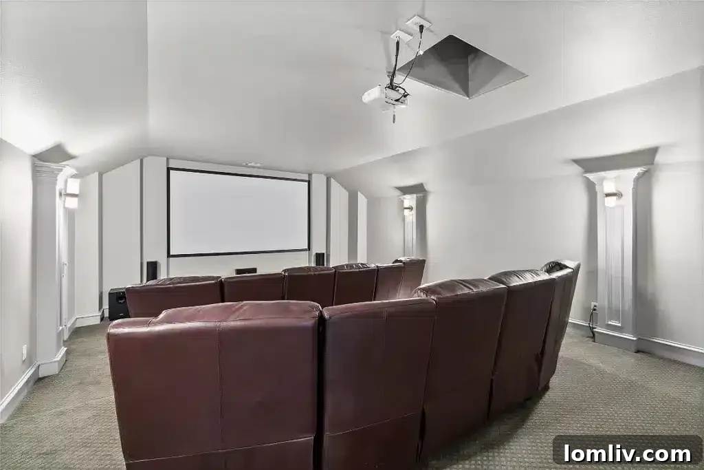 The 7,700-Square-Foot Celina Palace: Where Grandeur Reigns 7 A cozy yet spacious media room, perfect for home cinema experiences or gaming, with comfortable seating and subdued lighting.