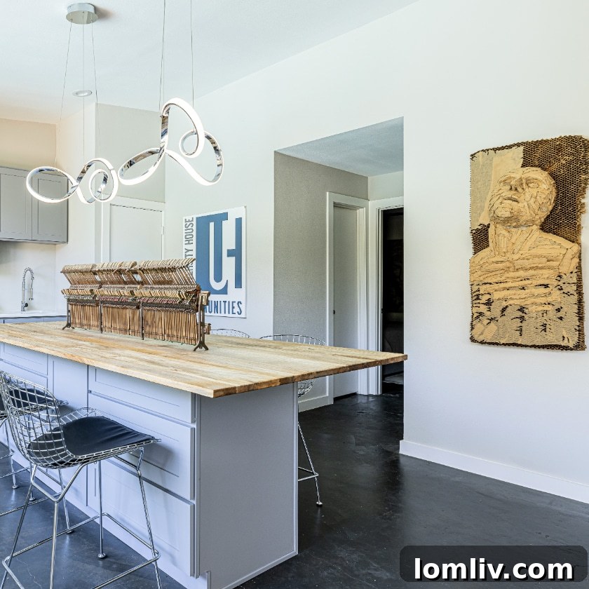 Bonnywood A Must-See on This Years Heritage Oak Cliff Home Tour 9 A stunning, modern pool house with an unseen art studio in the background, surrounded by meticulously designed landscaping.
