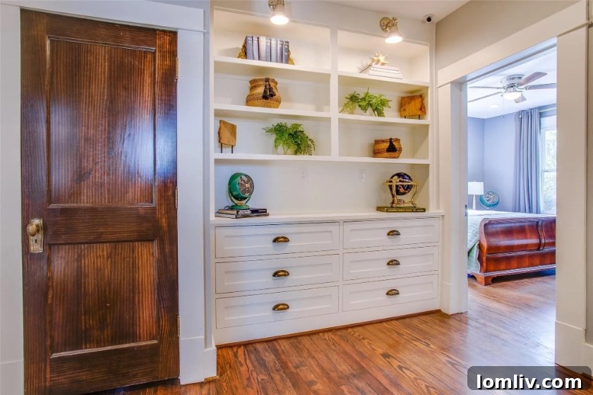 Interior view of the Winnetka Heights American Four-Square showcasing beautifully restored architectural details and period furniture