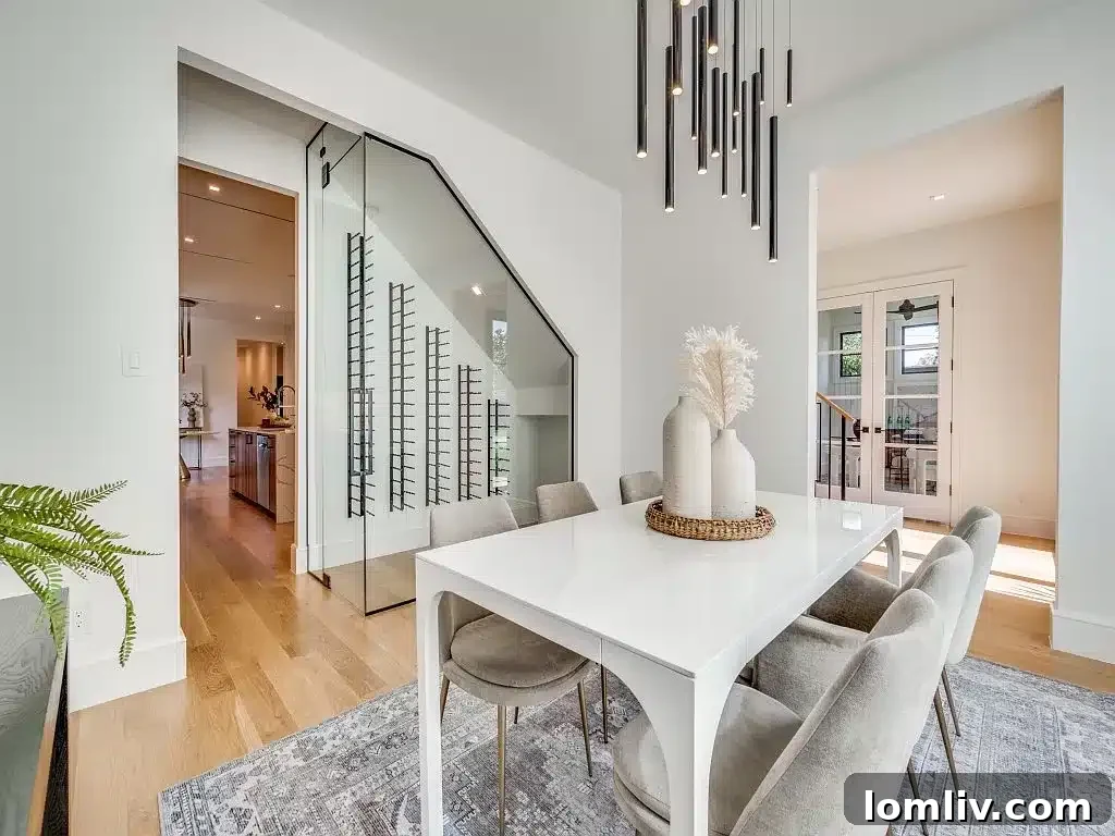 Ridgecrest Village: A Modern Masterpiece 6 A bright and spacious front-facing home office with large windows overlooking the neighborhood, ideal for productivity.