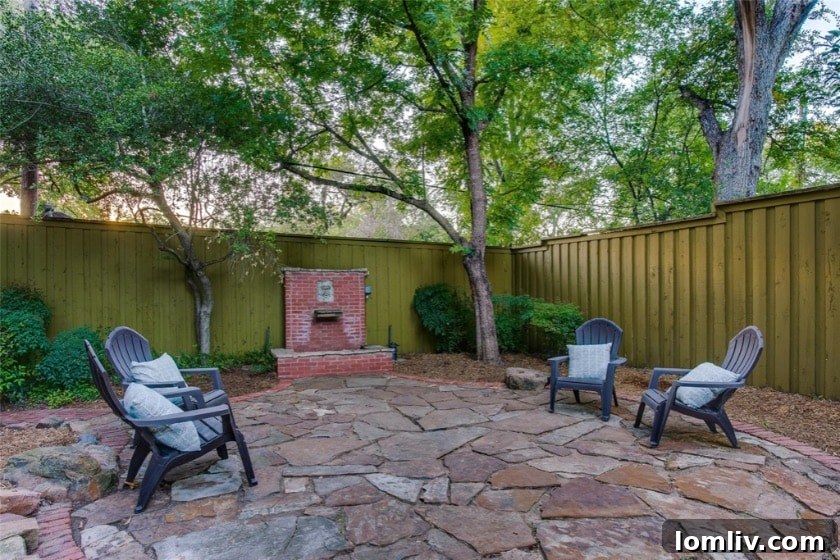 Charming Backyard Patio with Flagstone and Lush Greenery