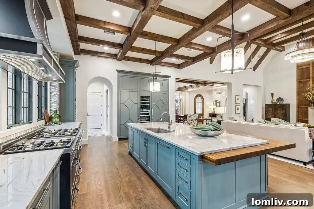 A pristine, gourmet kitchen with a large quartzite island, elegant wood cabinetry, and high-end appliances, perfect for baking.