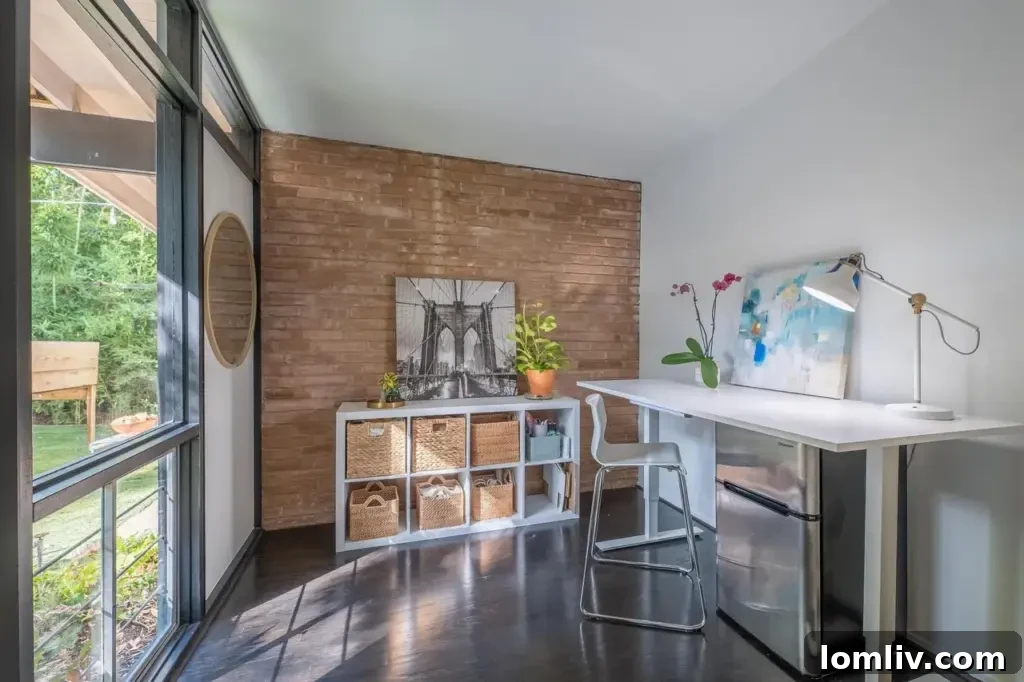 Modern primary bathroom with double vanities and a large glass-enclosed shower