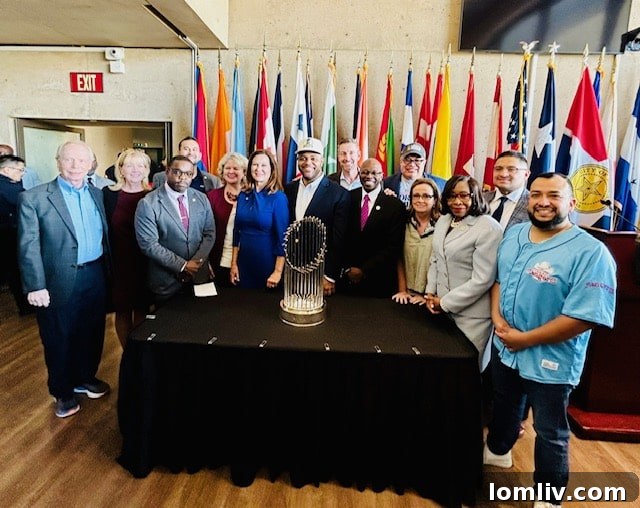 Rangers World Series: Dallas Celebrates, Real Estate Profits 2 The Texas Rangers proudly present their World Series trophy at Dallas City Hall, a symbol of their historic championship victory for the Dallas-Fort Worth region.