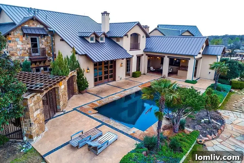 Rangers World Series: Dallas Celebrates, Real Estate Profits 7 An inviting view of the meticulously landscaped grounds surrounding a luxury home in the exclusive Vaquero community, featuring a pristine golf course.