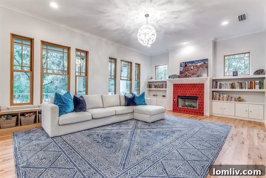 Spacious gourmet kitchen with modern stainless steel appliances and central island