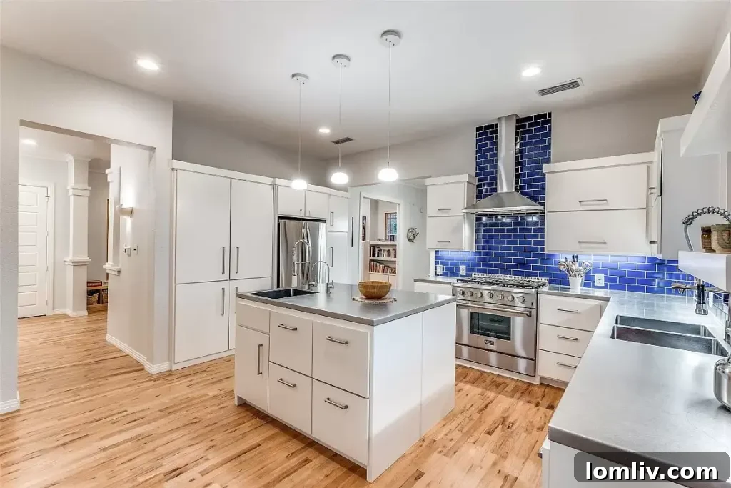 Close-up of kitchen island with vegetable sink, reverse osmosis filter, and stylish faucets