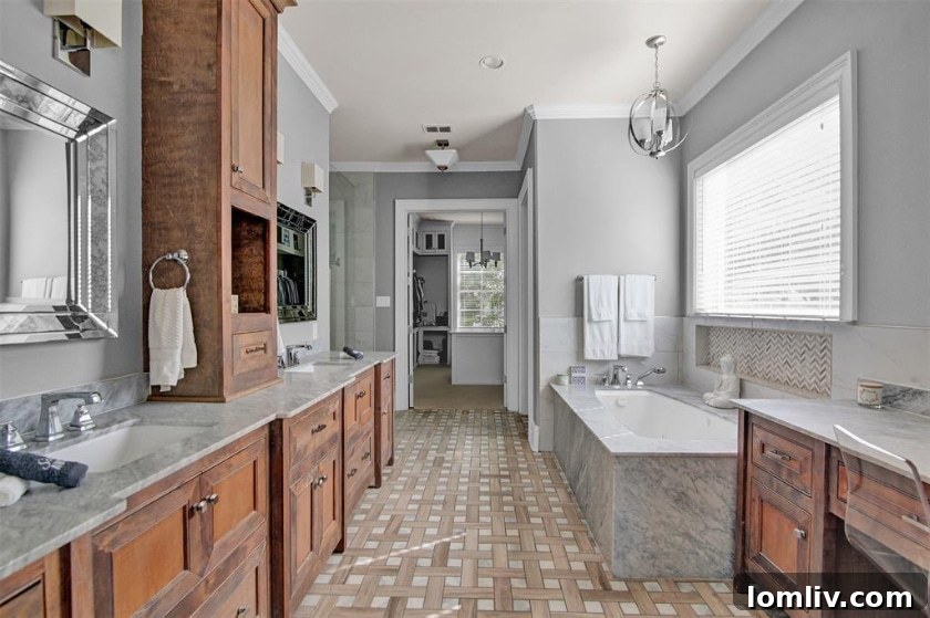 Spa-like primary bathroom with elegant fixtures