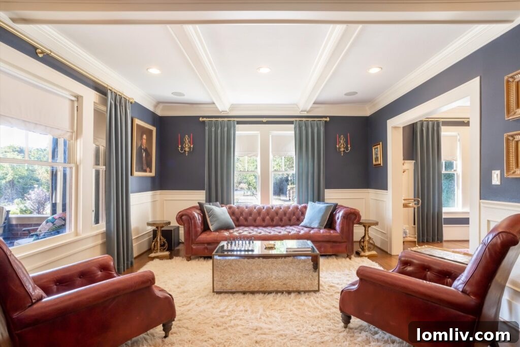 Elegant Living Room with Coffered Ceiling and Built-in Bookcases