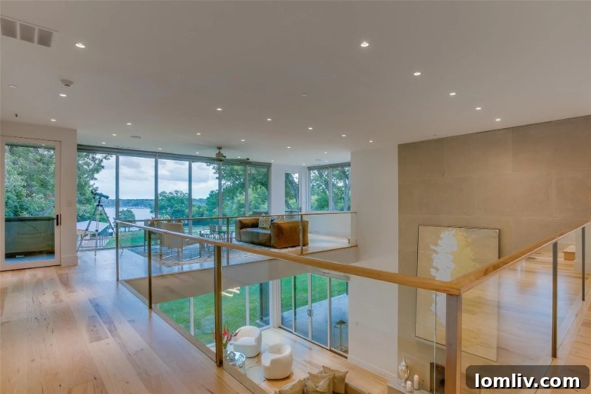 Staging and Professional Video Reimagine a Modern White Rock Lake Estate 13 Spacious game room with a wet bar on the second floor