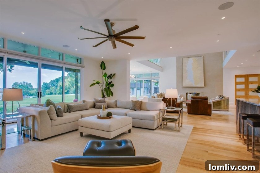 Staging and Professional Video Reimagine a Modern White Rock Lake Estate 8 Elegant living area on the first level of the White Rock Lake estate