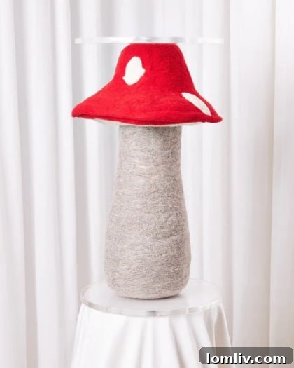 A whimsical mushroom-shaped side table, featuring a unique textured finish