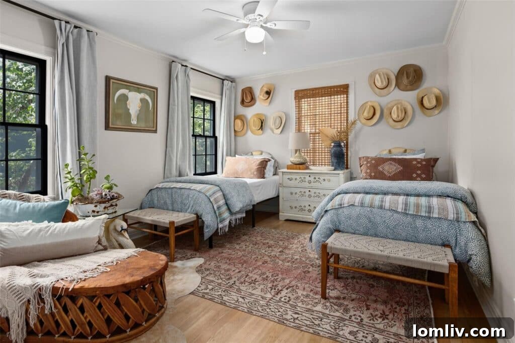 Another cozy bedroom, showcasing the home's consistent design aesthetic.