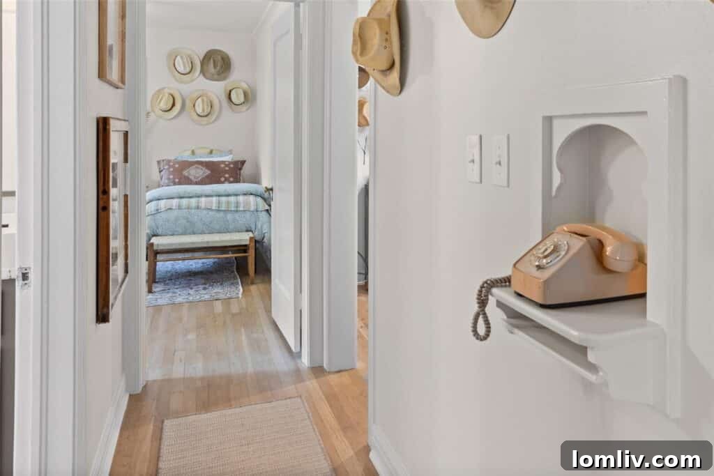 Another view of an updated bathroom, featuring thoughtful details.