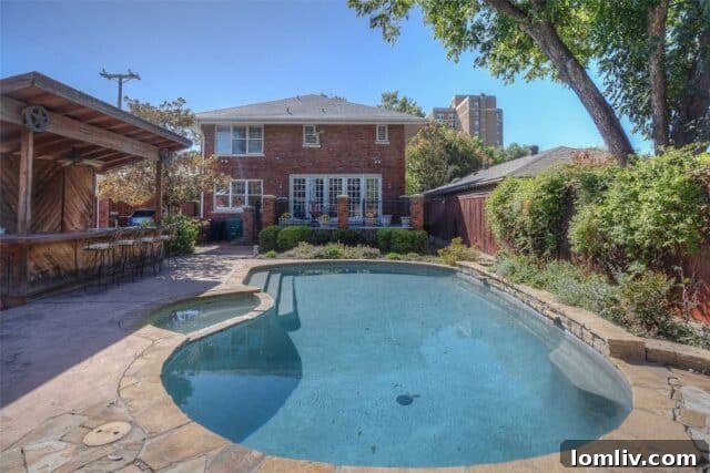 Mistletoe Heights: Classic Charm, Smart Investment 13 Spacious Backyard with Pool and Outdoor Kitchen at 2300 Mistletoe Drive