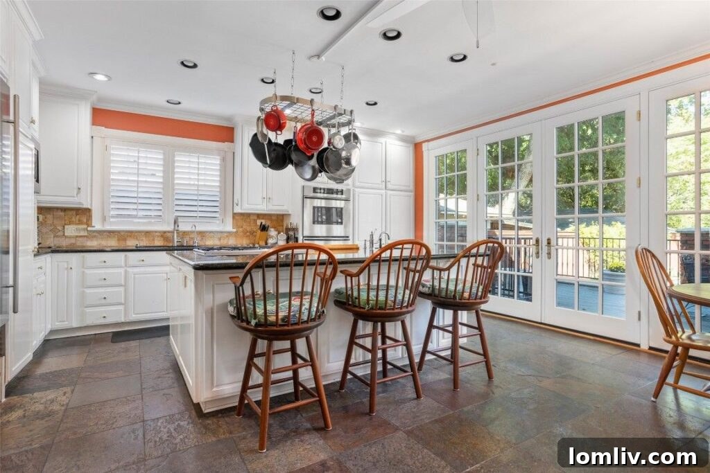 Mistletoe Heights: Classic Charm, Smart Investment 7 Modern Remodeled Kitchen with Island and French Windows
