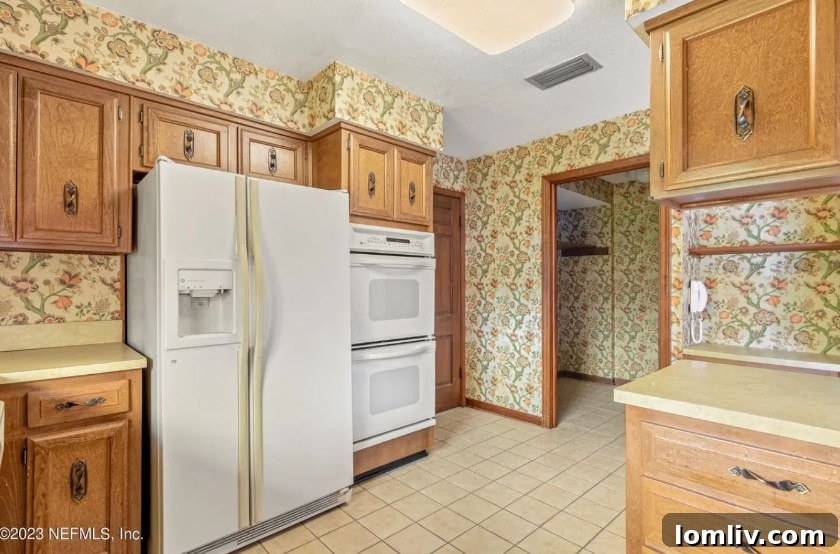 Another view of the Midcentury Modern kitchen, highlighting its unique cabinetry and layout for cooking