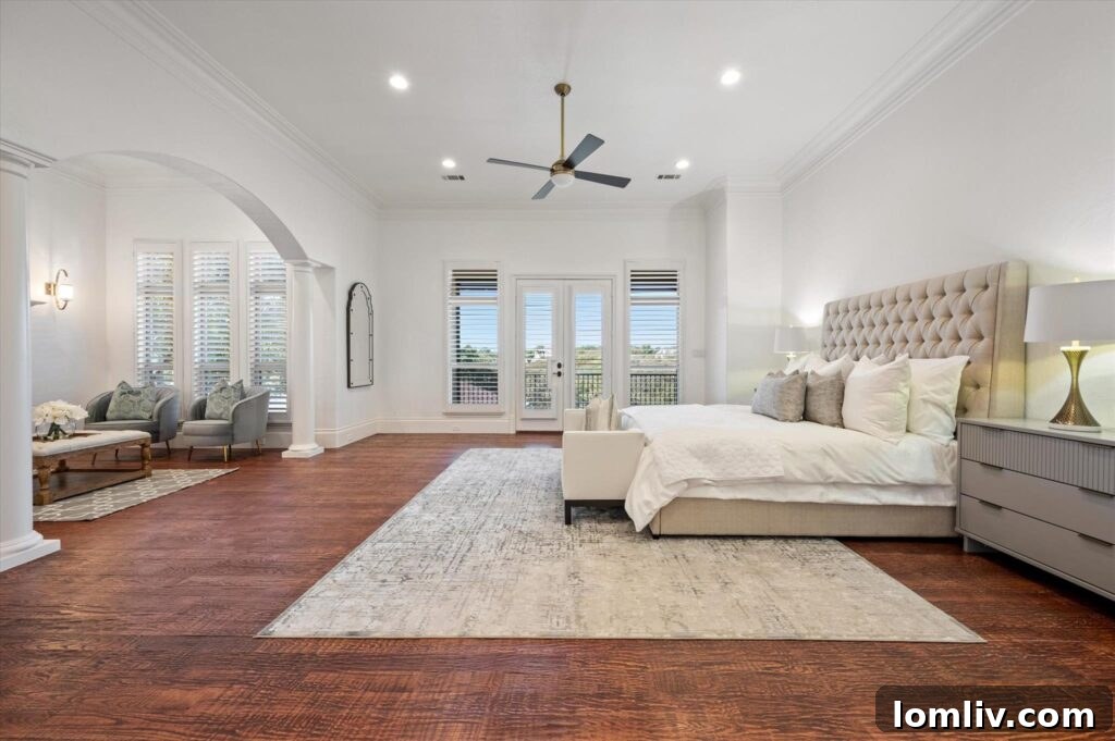 Point Noble's Crown Jewel: Historic Grandeur Meets Unrivaled Views 9 Stunning infinity pool overlooking the treeline and Grapevine Lake, part of the tiered backyard at 1501 Noble Way.