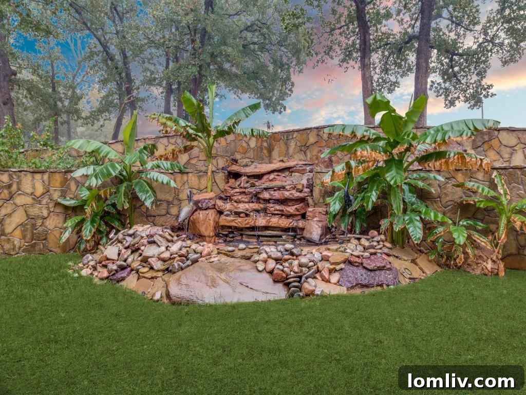 A tranquil water feature and meticulously designed landscaping at the front entrance of the home, creating a welcoming and serene first impression.