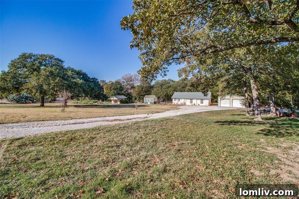 A complete and well-appointed guest house, featuring a full kitchen, bedroom, and bath, offering comfortable and private accommodations for visitors.