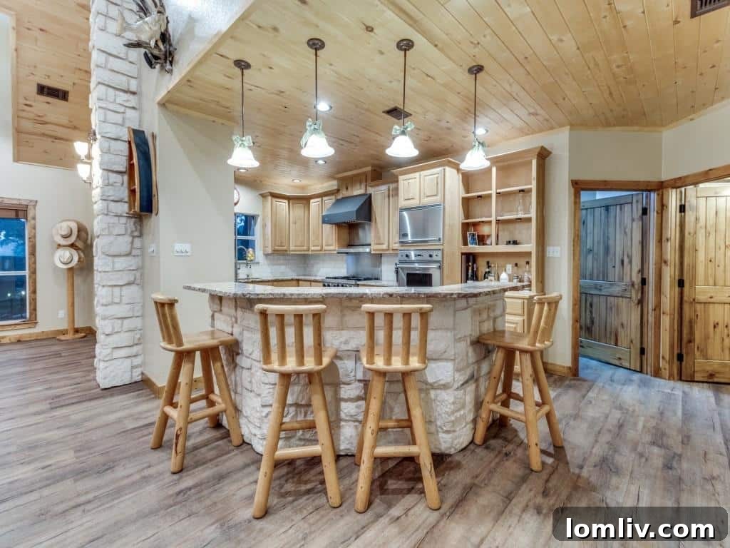 A modern gourmet kitchen with high-end commercial-grade appliances, expansive granite countertops, and a large central island, ideal for entertaining.
