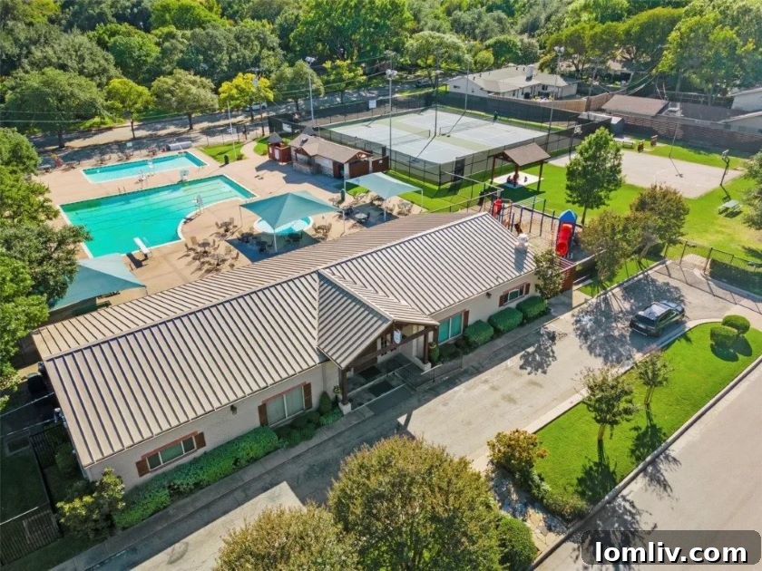 Sparkman Club Estates Home Tour: Unwrap Your Holiday Inspiration 3 Aerial view of Sparkman Club Estates, showcasing lush greenery and residential homes.