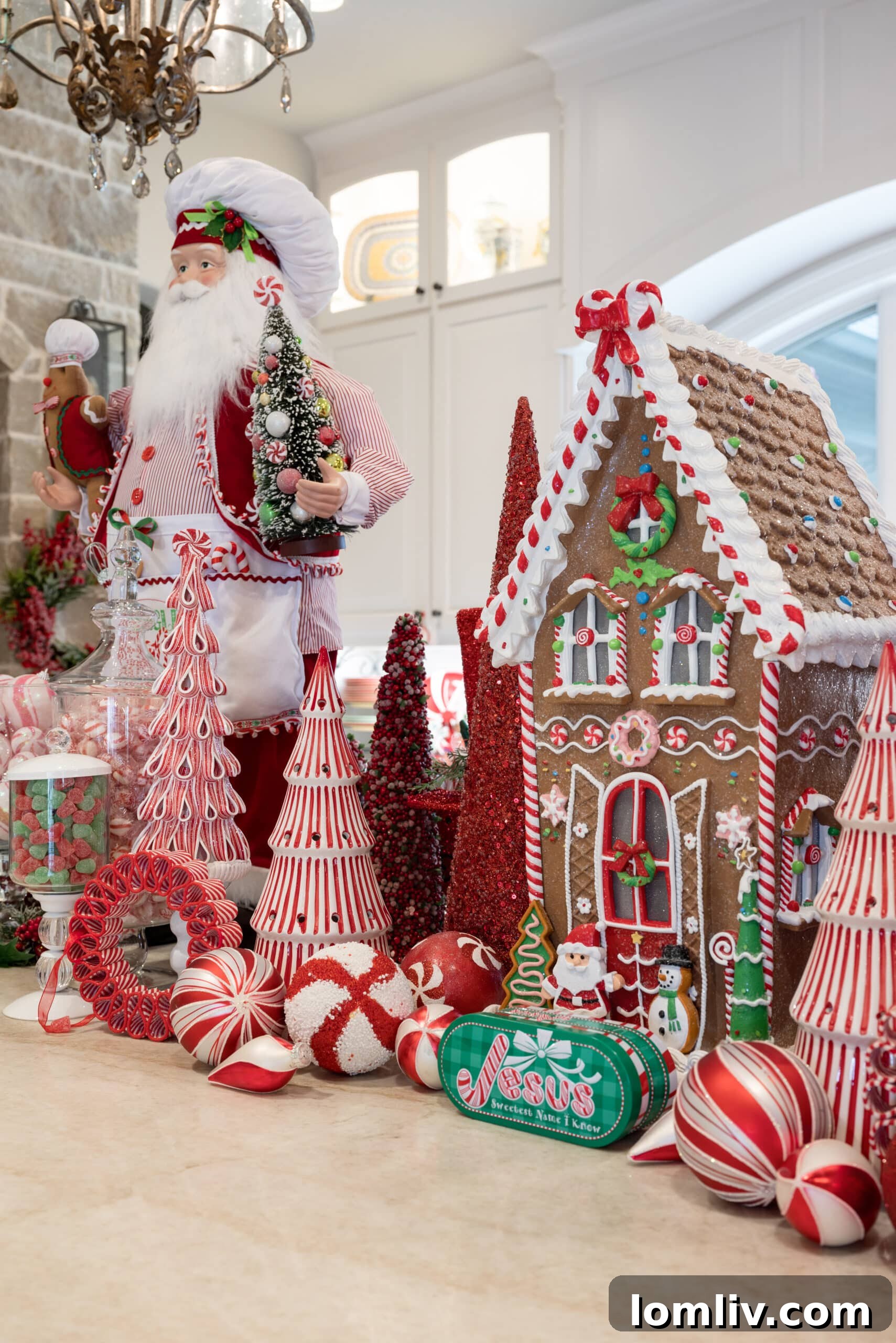 Colleyville Holiday Homes Today, Southlake Tours Next Week 12 Christmas tree decorated with vibrant red and white peppermint-striped ornaments, inspiring a unique and playful holiday theme in a Southlake home.