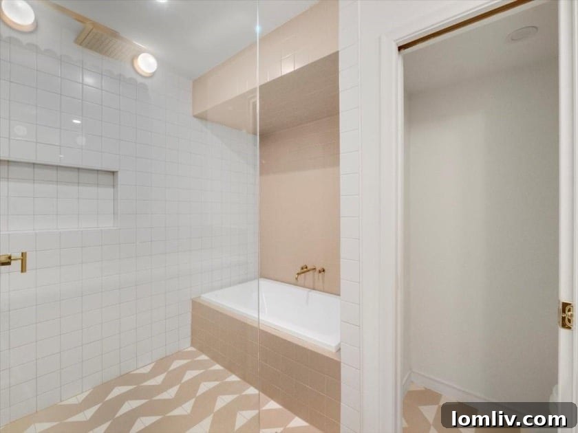 East Dallas's Newest Marvel by Sunscout Studio 12 A spacious and elegantly appointed bedroom, showcasing ample natural light and sophisticated decor.