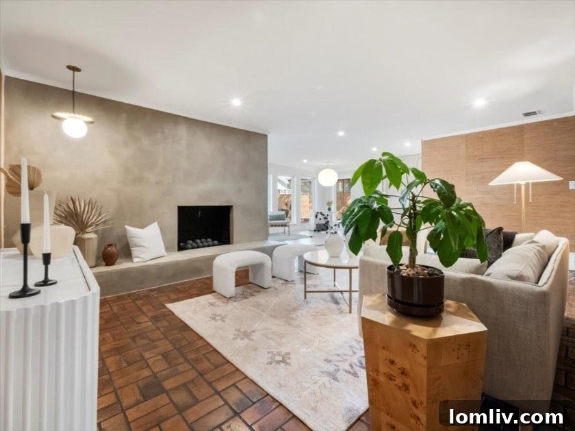 East Dallas's Newest Marvel by Sunscout Studio 3 Interior view showcasing original brick inlay flooring and sophisticated wallpaper in a seamlessly integrated modern design.