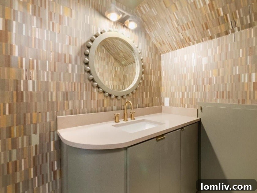 East Dallas's Newest Marvel by Sunscout Studio 4 A close-up of the elegant grasscloth wallpaper, demonstrating how original features were enhanced by Sunscout Studio's renovation.