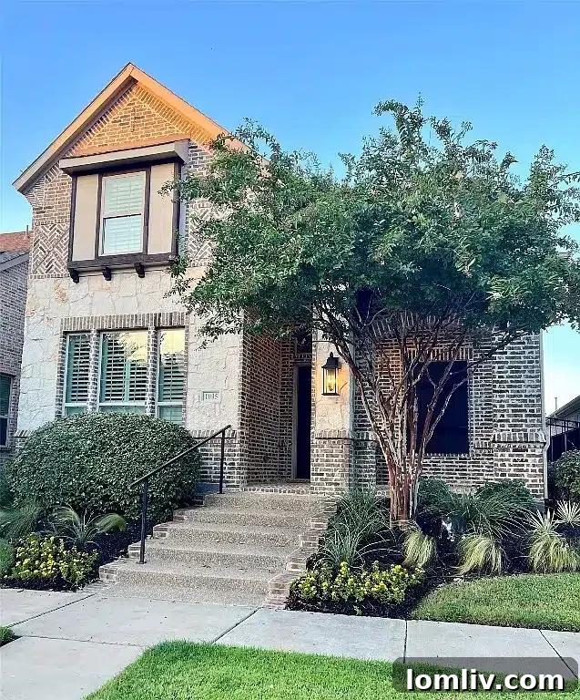 Exterior view of the modern townhouse at 1005 Ivory Trail in North Arlington, part of the Viridian master-planned community.